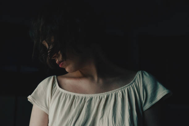Short haired young woman posing with white t-shirt