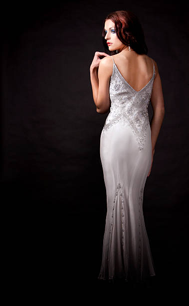 istock brunette in long dress 143405963