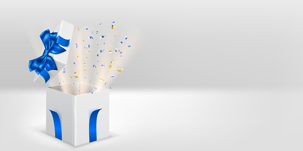 Festive illustration with open white gift box with blue ribbons and bow. Pieces of serpentine and rays of light fly out of it