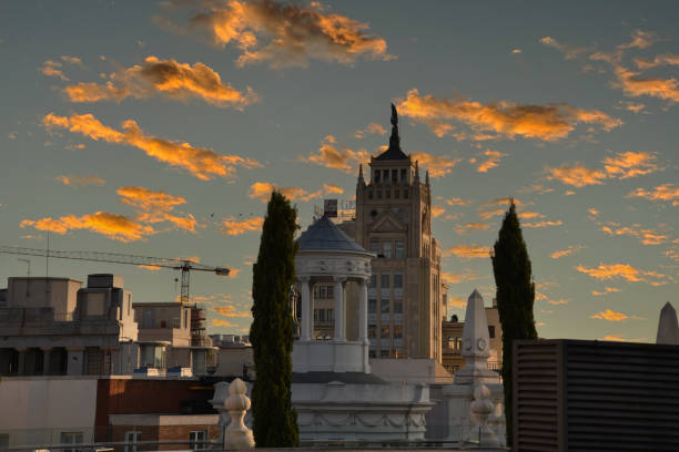 The Royal Palace of Madrid at night with Plaza de España in foreground. Madrid. Spain.