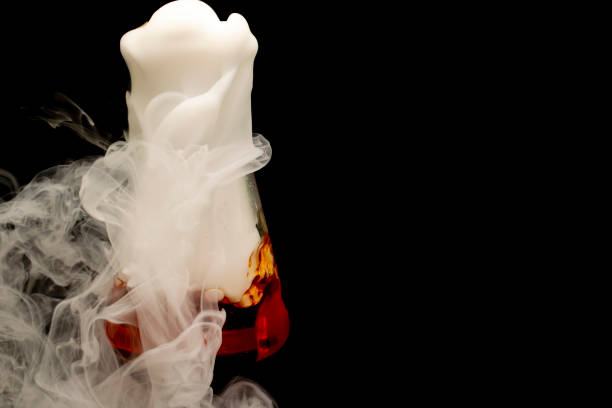 istock clouds of thick smoke pouring from a chemical flask 1434069526