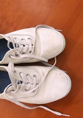A pair of white canvas shoes