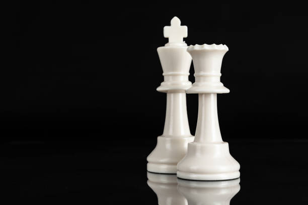 istock Chess piece close up on black background. Leadership concept 1434075265