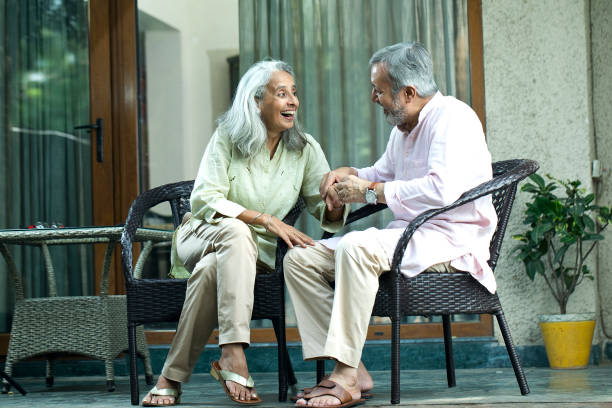 istock Old couple discussing outdoors on porch 1434075830