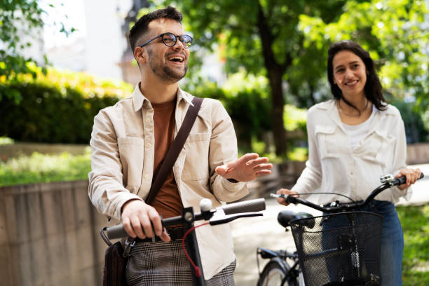 istock Boyfriend and girlfriend riding a bicycle in the park 1434077278