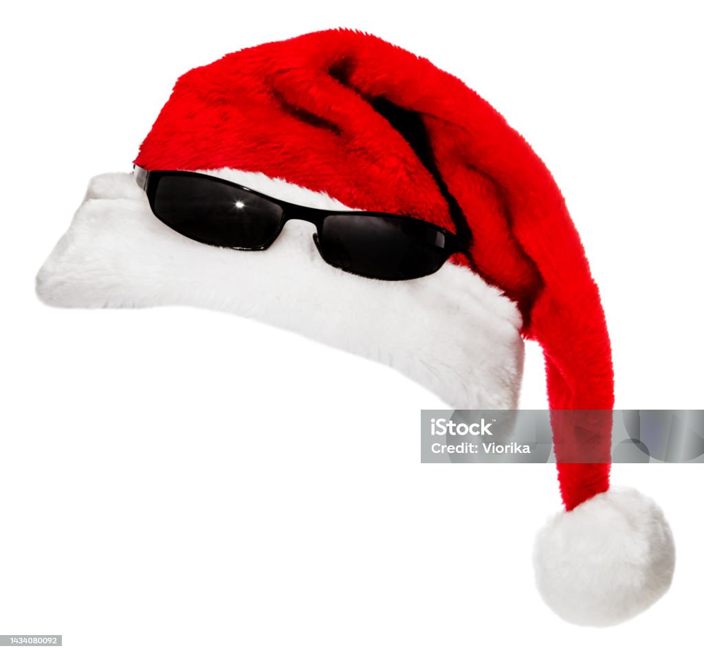 Santa Hat with sunglasses on white Santa Hat with sunglasses isolated on a white background. Cap - Hat Stock Photo