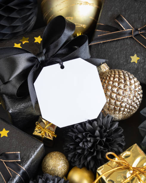 istock Black and golden Christmas Gift Boxes and ornaments, square gift tag Mockup 1434080322
