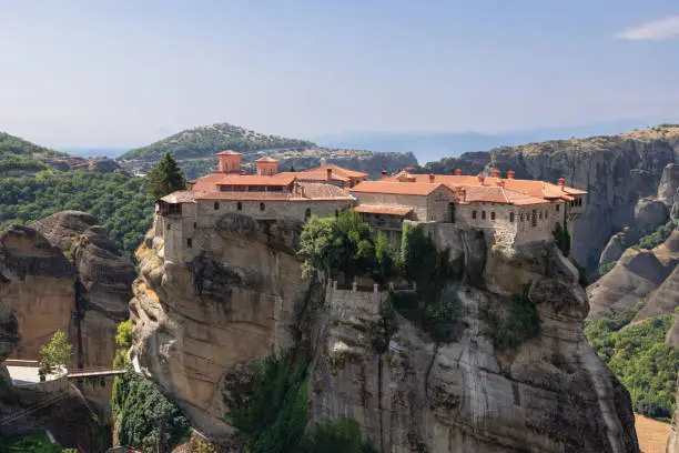 Photo of The only wooden narrow entrance bridge to the Holy St Varlaam Monastery connects it with mainland Greece, Meteora, Trikala, Thessaly, Greece