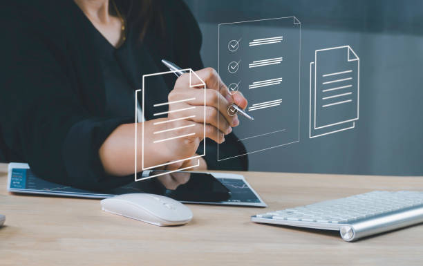 istock Electronic signature concept, business people using pen sign electronic documents on digital documents, paperless office, future business contract signing. 1434087148