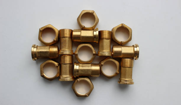 istock Water Meter Fittings With Union Nuts Laid Out In Order On White Surface Top View 1434087903