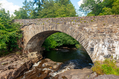 Bridge at The Falls of Dochart, near Killin in the Loch Lomond and The Trossachs National Park, Scotland, UK.