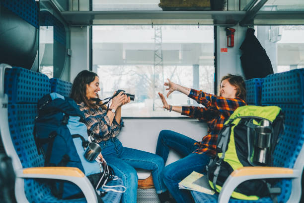 istock Couple traveling in train and vlogging 1434102130