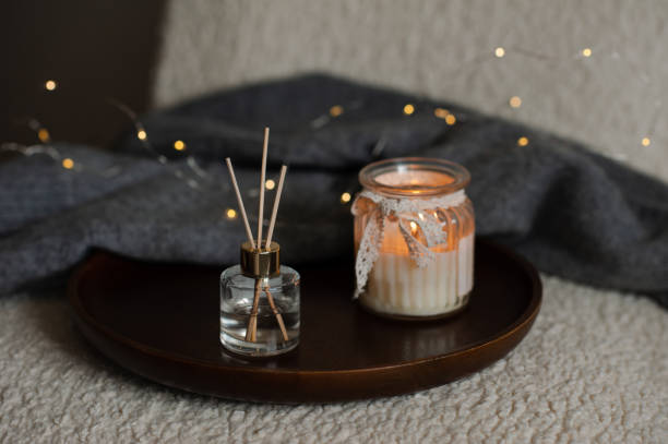istock Home fragrance with scented candle over lights 1434102861