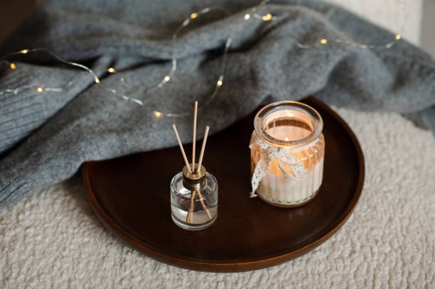 istock Home fragrance with scented candle over lights 1434102862