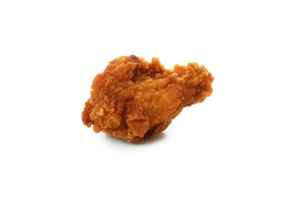 istock Tasty fried chicken isolated on white background 1434105037