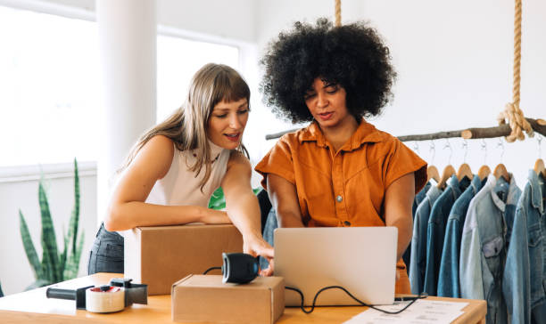 istock Thrift store owners preparing online orders in their shop 1434105922