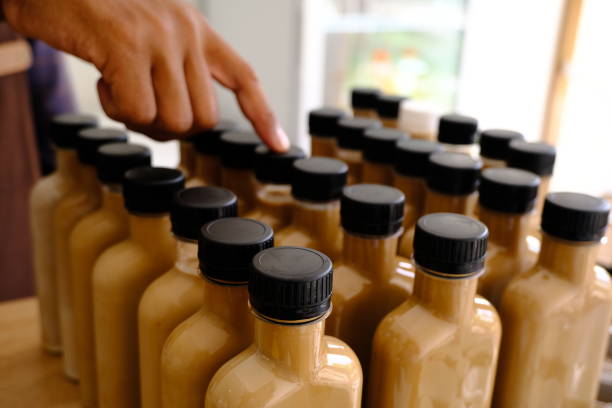 istock a barista is selecting and preparing the bottled coffee 1434108235