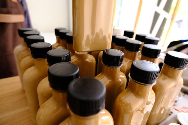 istock a barista is selecting and preparing the bottled coffee 1434108340
