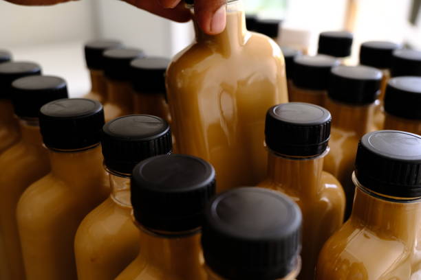 istock a barista is selecting and preparing the bottled coffee 1434108801