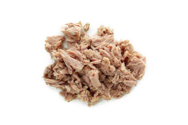 istock Tasty canned tuna isolated on white background 1434110373