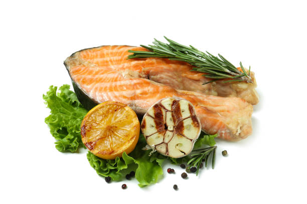 istock Tasty grilled salmon isolated on white background 1434111915