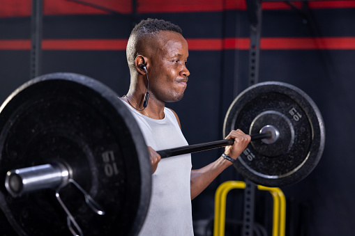 Black African American Man Holding Barbell Ready For Weight Lifting Workout