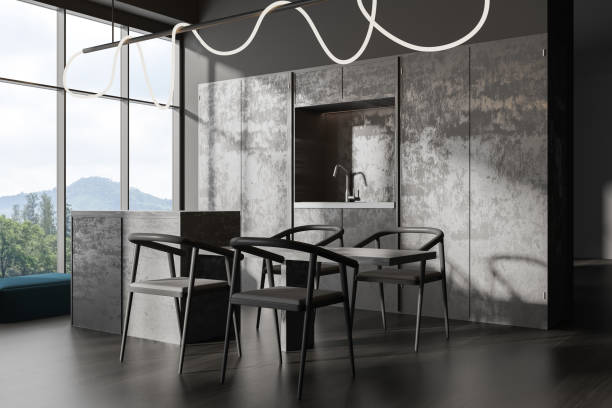 istock Grey kitchen interior with bar island, table and seats, panoramic window 1434113117