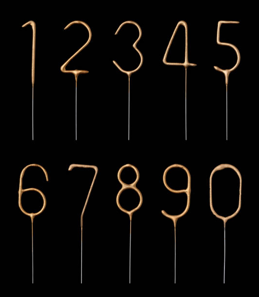 istock Golden sparklers in numbers digits shape set isolated on black 1434113240