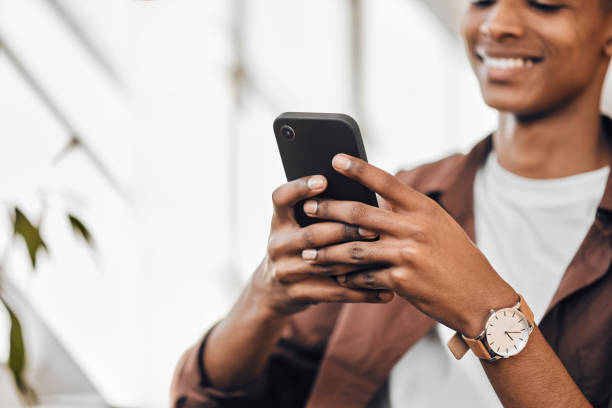 istock Communication, phone or happy black man typing social media app post, check email or relax. Digital web search, multimedia message or young gen z student with mobile smartphone chat to online contact 1434114745