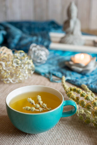 istock Tea in a turquoise cup with decoration - Greek mountain tea, herbal tea, white tea 1434114954