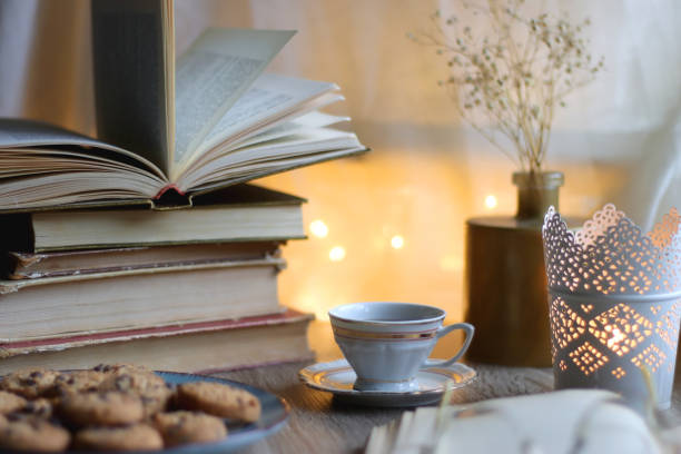 istock Cookies, Tea, Books and Candle 1434115829