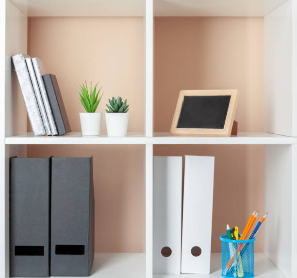 istock File folders, standing on the shelves at office 1434115994