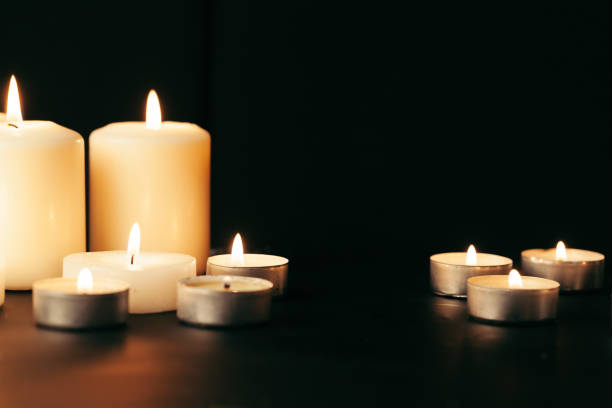 istock Many burning candles with shallow depth of field 1434116529