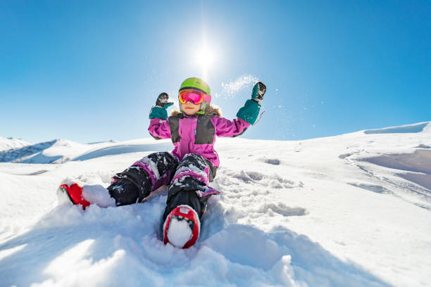 istock Little girl having fun at ski resort 1434117063