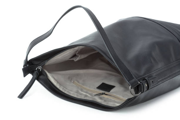 istock Black leather female handbag isolated on white background 1434118802