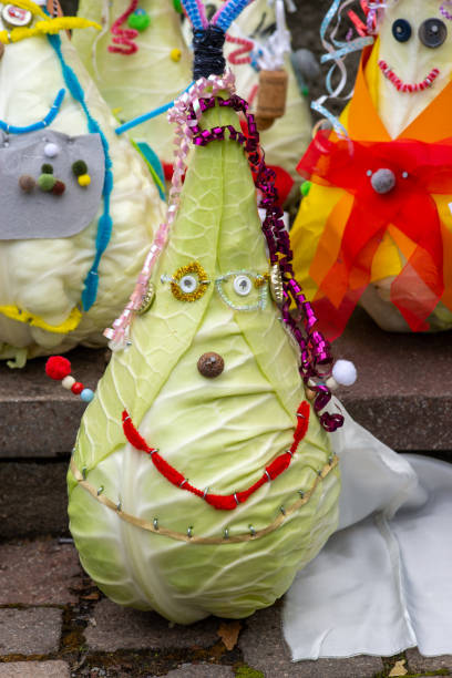istock pointed cabbage decorated like a face, crafts, funny smile 1434119043