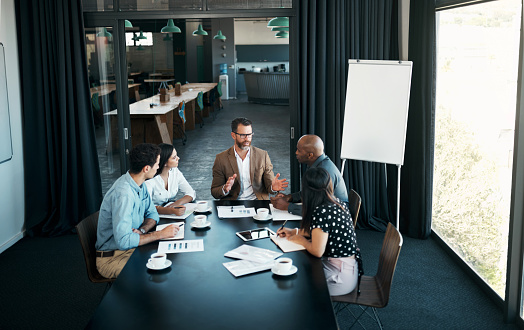Business people, meeting or collaboration teamwork in office boardroom for men, women or manager leadership. Talking ceo, mentor or ceo in worker diversity, innovation strategy or motivation training