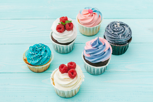 delicious cupcakes on a colored background. Festive background, birthday