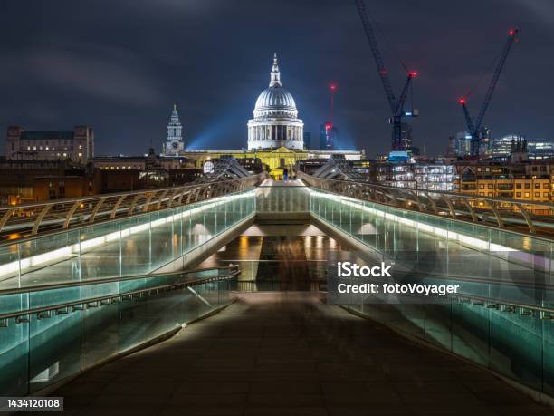 London St Pauls Cathedral Dome Spotlit Over Millennium Bridge Night Stock Photo - Download Image Now