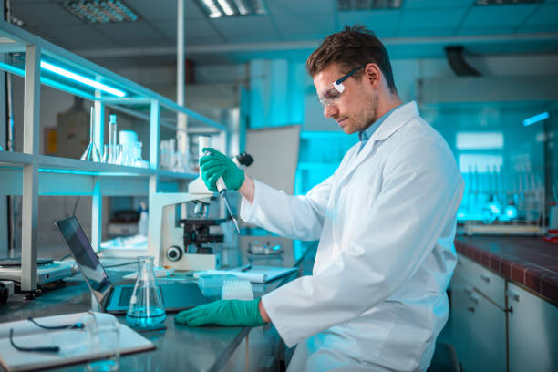 istock Handsome Male Researcher at a Lab Counter 1434121151