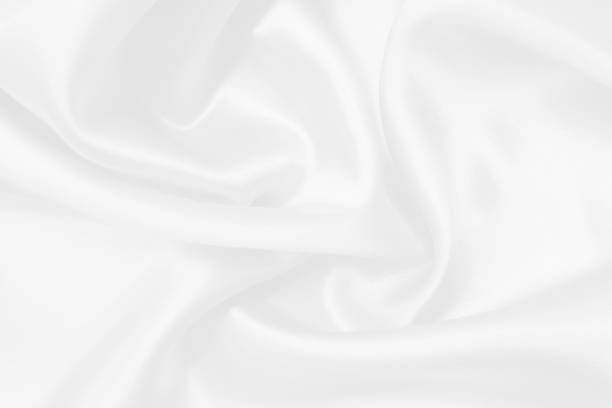 istock White fabric texture background, detail of silk or linen pattern. 1434121454