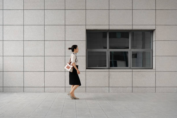 istock Walking business lady 1434122300