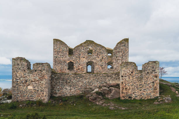The ruins of Brahehus Castle are located by the lake Vattern near Granna in Smaland, Sweden. The ruins of Brahehus Castle are located by the lake Vattern near Granna in Smaland, Sweden. The castle was abandoned by the 1680s and suffered a fire in 1708. jonkoping stock pictures, royalty-free photos & images