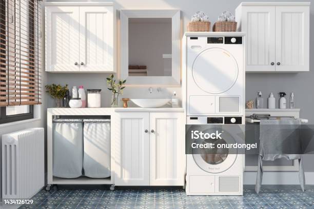 Modern Bathroom With Washing Machine Dryer White Cabinets And Drying Rack Stock Photo - Download Image Now