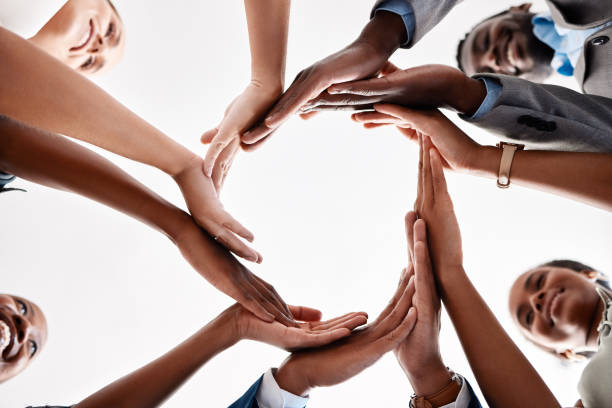 istock Diversity, circle hands and teamwork collaboration for success goal, and motivation and global company innovation. Zoom of business people, women and men workers in community group, support or trust 1434127194