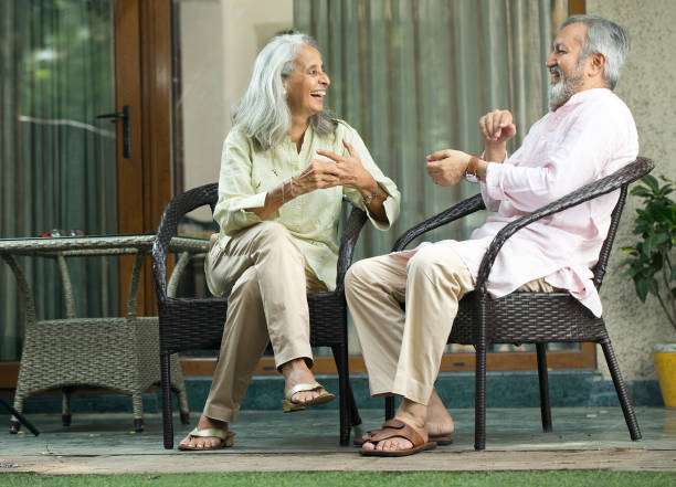 istock Old couple discussing outdoors on porch 1434127536