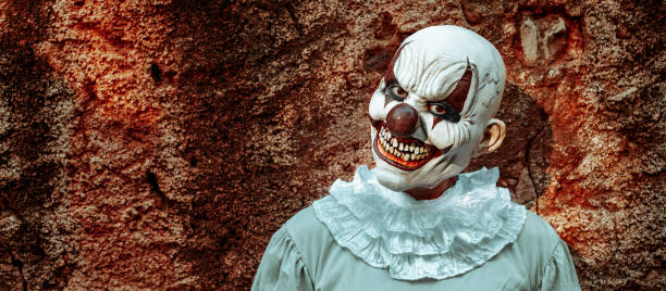 istock evil clown in an abandoned house, web banner 1434129201
