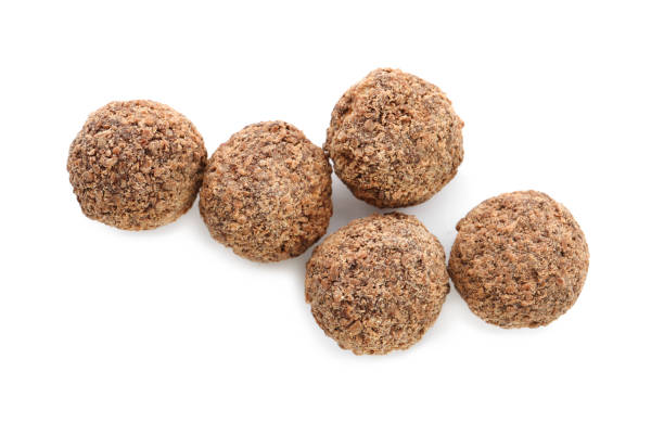 istock Delicious chocolate truffles on white background, top view 1434131385
