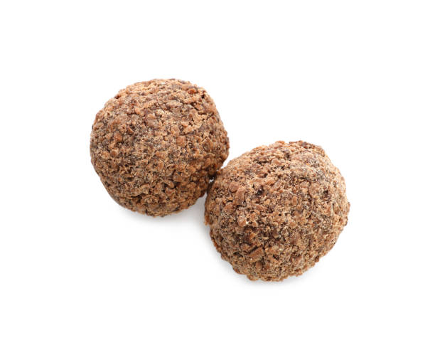 istock Delicious chocolate truffles on white background, top view 1434131646