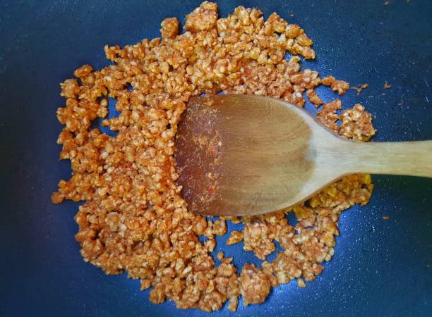istock Frying Minced pork with Chili paste - Thai food preparation. 1434133135